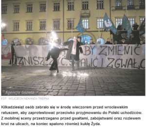 zrzut ekranu z gazeta.pl. Nacjonaliści palą kukłę ŻYda na demonstracji pod wrocławskim ratuszem 