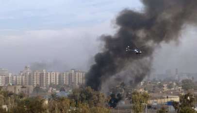 Helikopter Blackwater nad płonącym Bagdadem. To samo szykuje się w Jemenie / fot. Wikimedia Commons