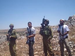 Izraelscy osadnicy i żołnierze / fot. Wikimedia Commons